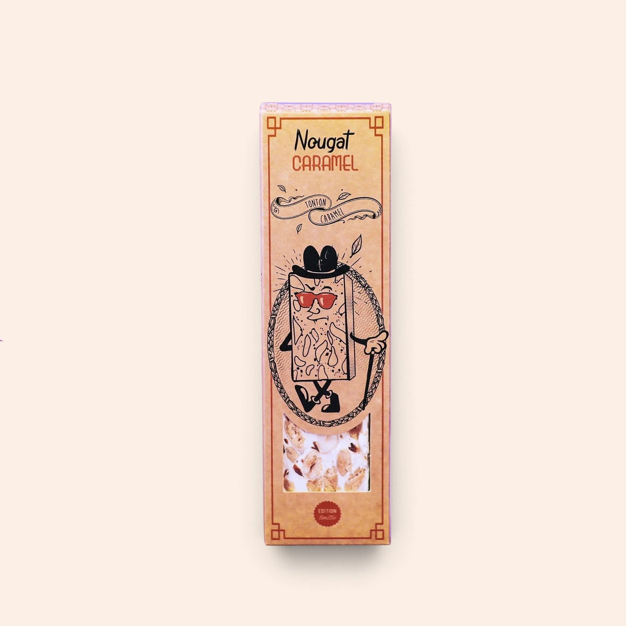 Barre de nougat au caramel Maison Fruidoraix Monsieur Caramel dans son emballage illustré avec fenêtre transparente
