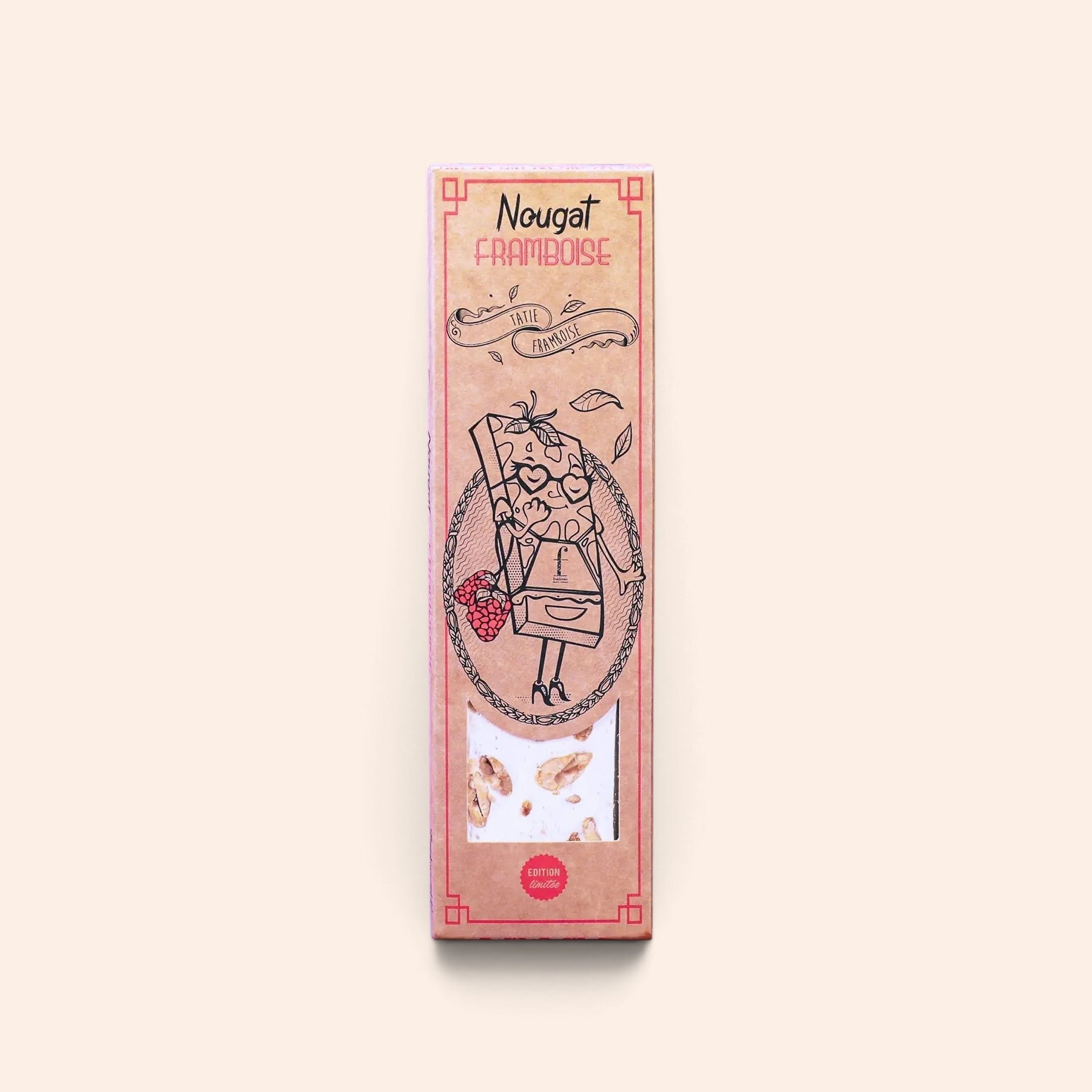 Barre de nougat framboise Maison Fruidoraix dans son emballage en carton kraft illustré avec fenêtre transparente