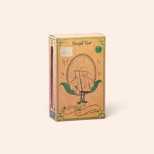 Boîte de nougat noir Monsieur Dur Maison Fruidoraix avec illustration vintage sur fond crème