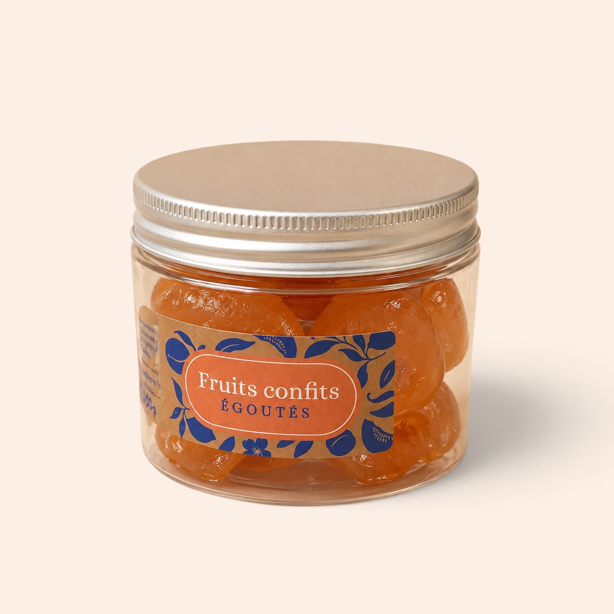 Pot de fruits confits Maison Fruidoraix avec étiquette décorative sur fond clair