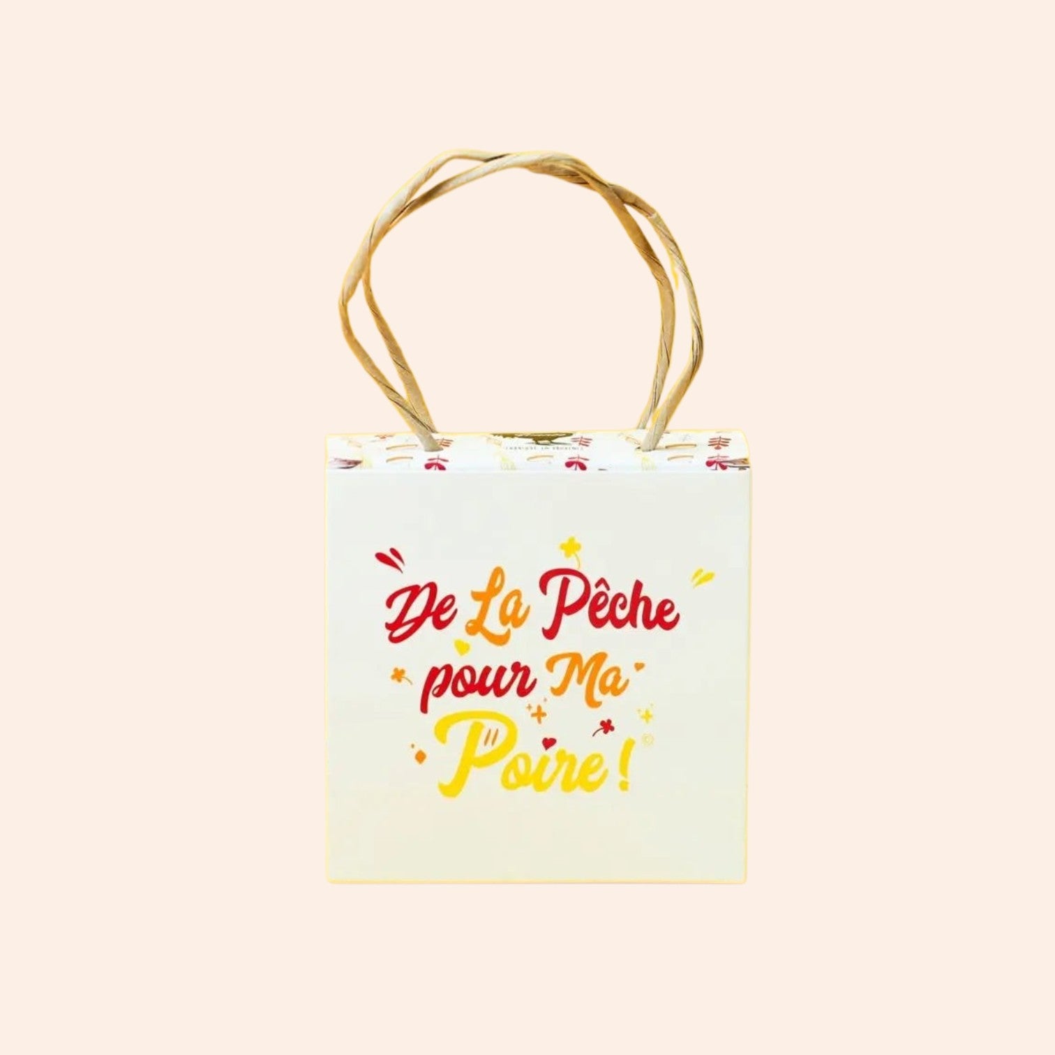 Sac cadeau Maison Fruidoraix contenant des mini calissons à la pêche et à la poire, design élégant et festif