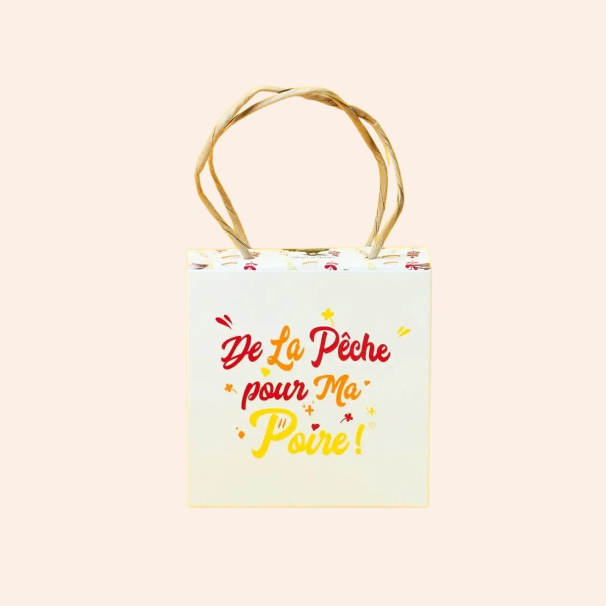 Sac cadeau Maison Fruidoraix contenant des mini calissons à la pêche et à la poire, design élégant et festif